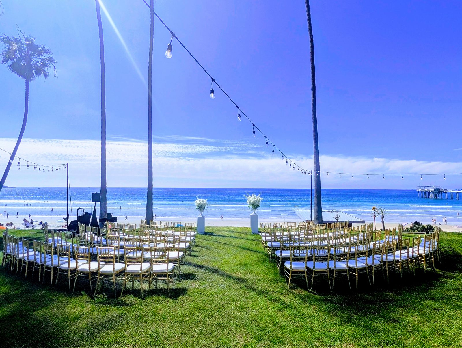 Oceanfront wedding ceremony setup on the lawn at Scripps Seaside Forum in La Jolla